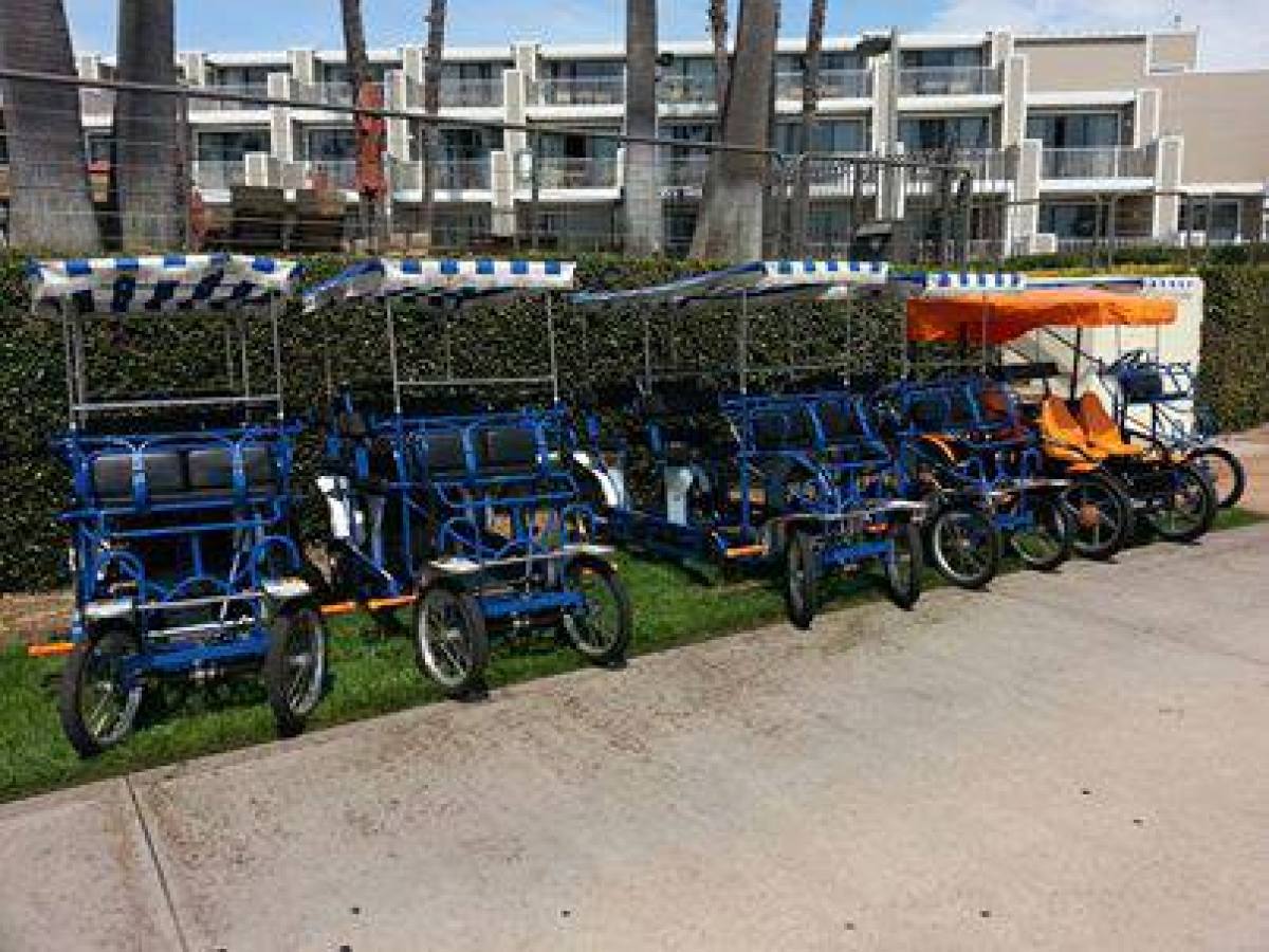 a bicycle is parked near a fence